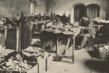 Solomon Schecter examines manuscripts from the Cairo Geniza
